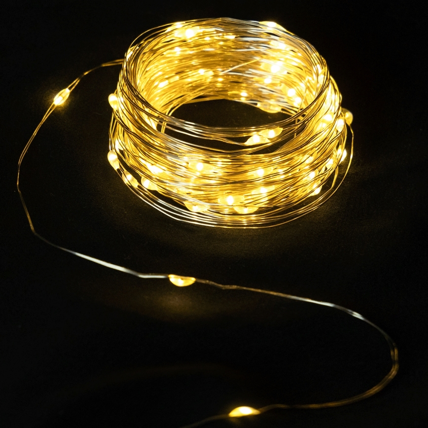 Aigostar - Catena luminosa LED da esterno 50 LED/8 funzioni 3xAA 5,3 m bianco caldo
