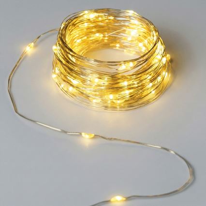 Aigostar - Catena luminosa LED da esterno 50 LED/8 funzioni 3xAA 5,3 m bianco caldo
