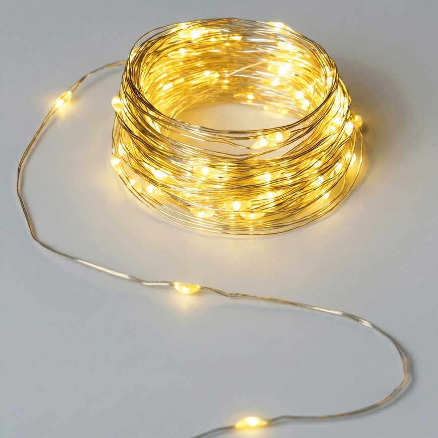 Aigostar - Catena luminosa LED da esterno 50 LED/8 funzioni 3xAA 5,3 m bianco caldo