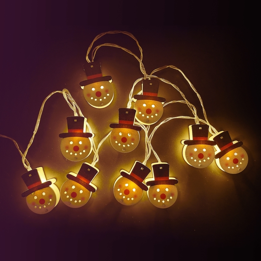 Aigostar - Catena luminosa LED natalizia 10xLED/3xAA 1,5m bianco caldo con pupazzo di neve