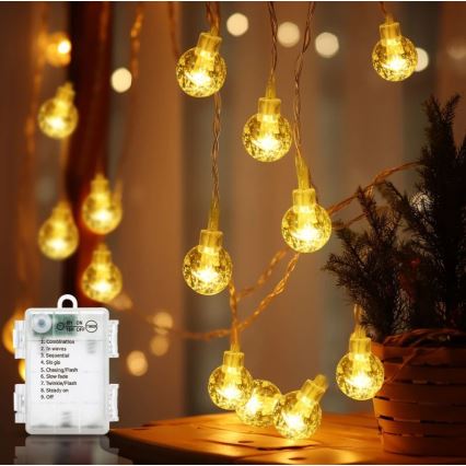 Aigostar - Catena luminosa da esterno 100xLED/3xAA/8 funzioni 10,3 m IP44 bianco caldo