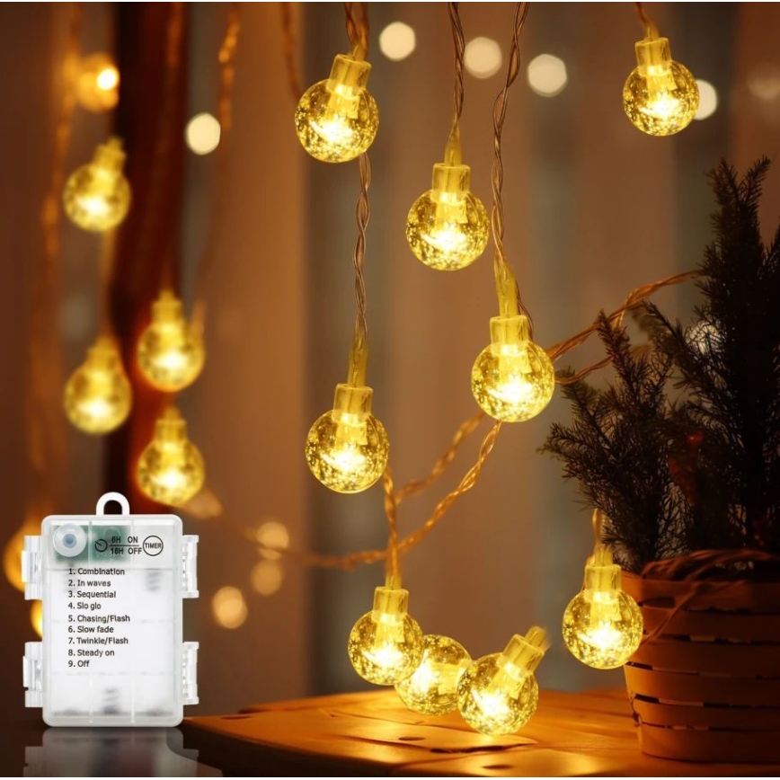 Aigostar - Catena luminosa da esterno 100xLED/3xAA/8 funzioni 10,3 m IP44 bianco caldo