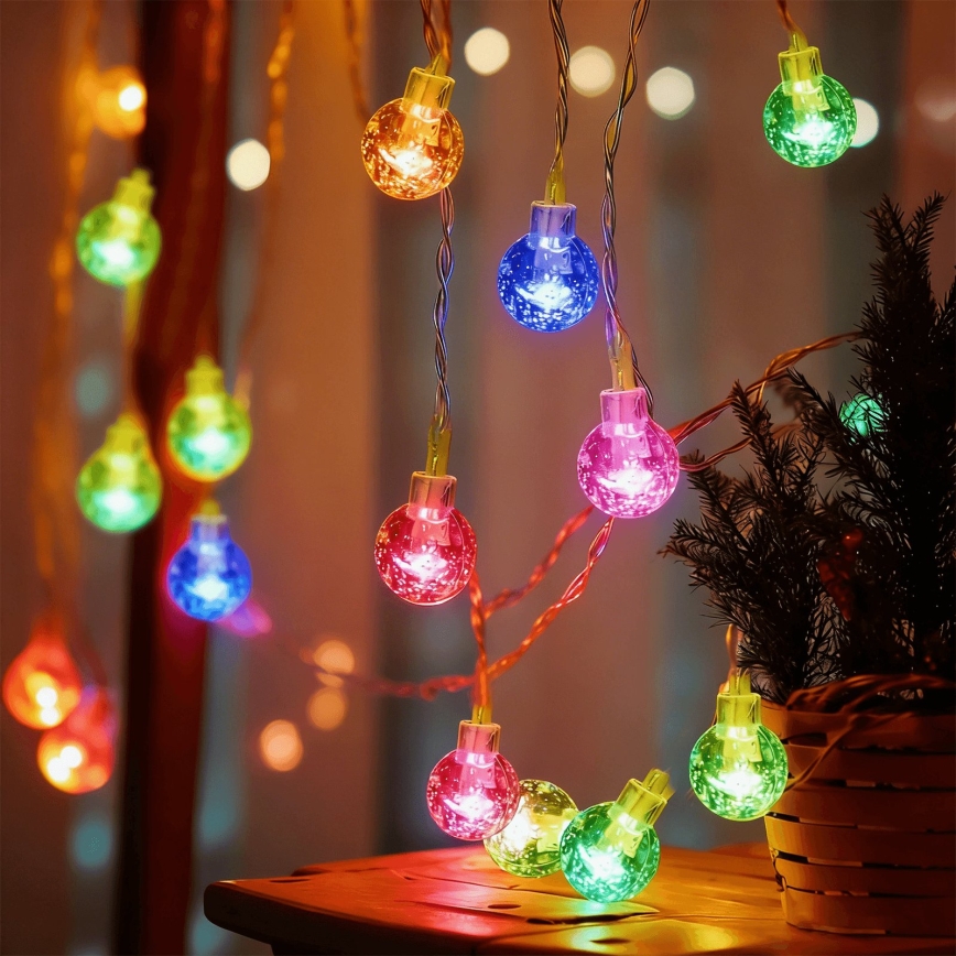 Aigostar - Catena luminosa natalizia LED per esterni 50xLED/8 funzioni 3xAA 5,3m IP44 multicolore