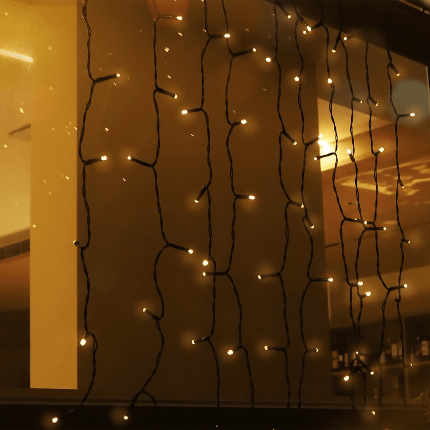 Aigostar - Catena solare LED 100xLED/8 funzioni 4x1m IP65 bianco caldo 800 mAh