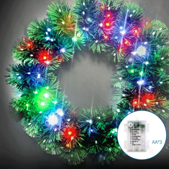 Aigostar - Ghirlanda natalizia da esterno LED RGBY, 72 LED, alimentazione 3xAA, diametro 50 cm, IP44