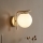 Brilagi - Lampada da parete MILO 1xE27/60W/230V dorata