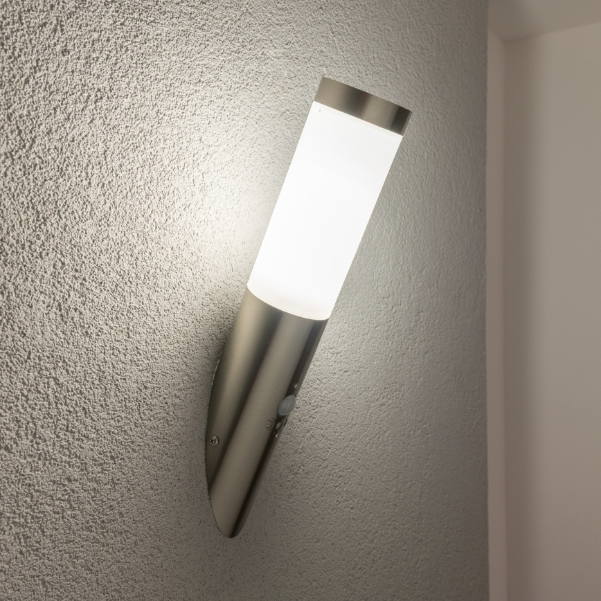 BRILAGI - Lampada da parete per esterni con sensore ELIA 1xE27/20W/230V IP44, cromo satinato