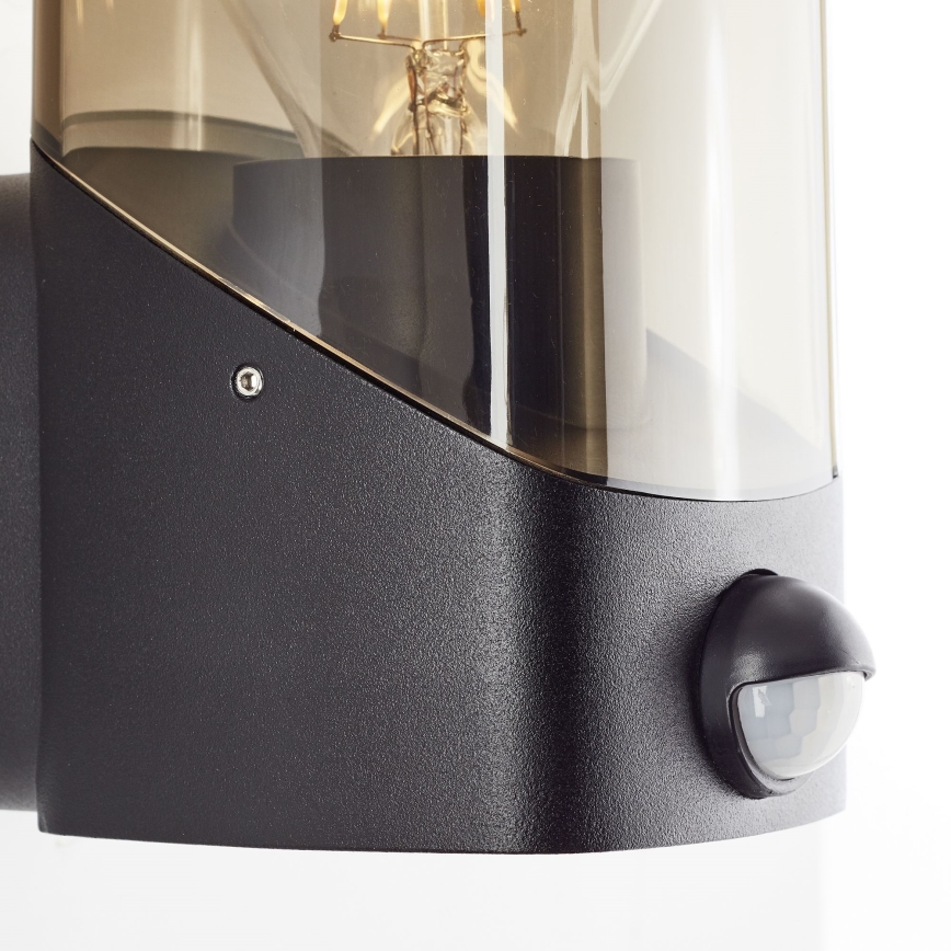 Brilliant - Applique da esterno con sensore MINOU 1xE27/10W/230V IP44 nero/fumé