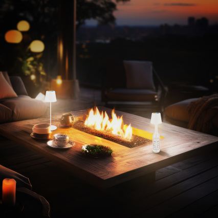 Briloner 7510016 - Lampada da tavolo ricaricabile da esterno dimmerabile LED RGBW CALIDA LED/2,5W/5V IP44 1200 mAh bianca