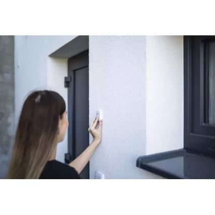 Campanello wireless con spina integrata 230V + 1xCR2032 IP44 bianco
