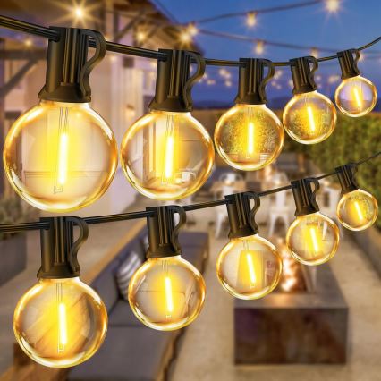 Catena luminosa LED dimmerabile per esterni 25xE12/1W/24/230V 17,5 m IP65 nera + telecomando