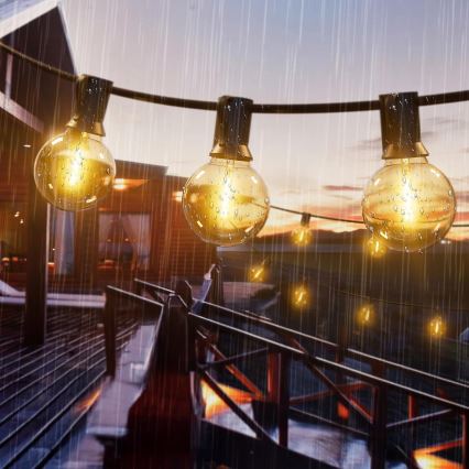 Catena luminosa LED dimmerabile per esterni 25xE12/1W/24/230V 17,5 m IP65 nera + telecomando