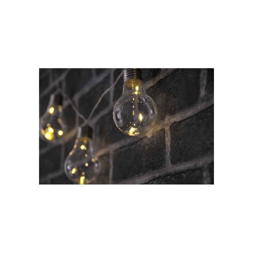 Catena luminosa decorativa a LED SMOLDER, 2,1 m — 10 LED, alimentata da 2 batterie AA