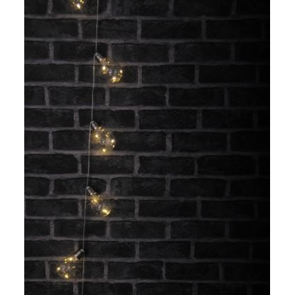 Catena luminosa decorativa a LED SMOLDER, 2,1 m — 10 LED, alimentata da 2 batterie AA