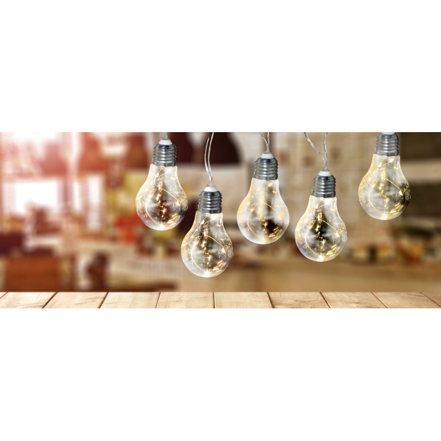 Catena luminosa decorativa a LED SMOLDER, 2,1 m — 10 LED, alimentata da 2 batterie AA