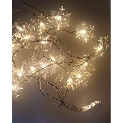 Catena luminosa LED da esterno, 20xLED/2xAA, 2,2 m, IP44, bianco caldo, fiocchi di neve
