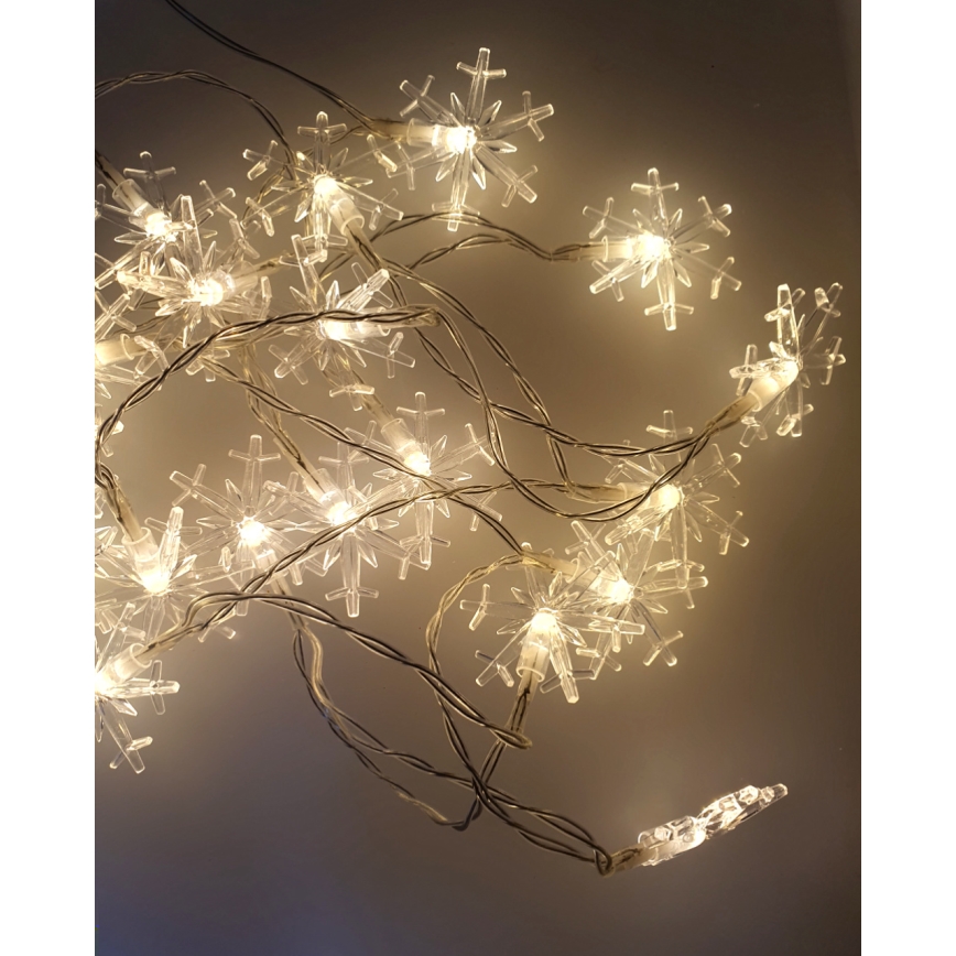 Catena luminosa natalizia LED per esterni 20xLED/2xAA 2,2 m IP44 bianco caldo a fiocchi di neve