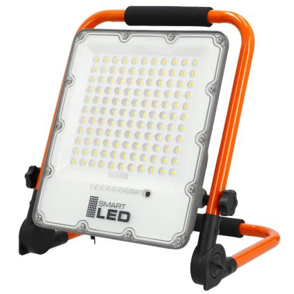 Faretto LED ricaricabile con treppiede LED/100W/3,2V 5000K 5000 mAh IP65 arancione