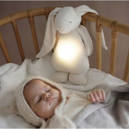 Moonie - Amico di coccole con una melodia e luce coniglietto crema