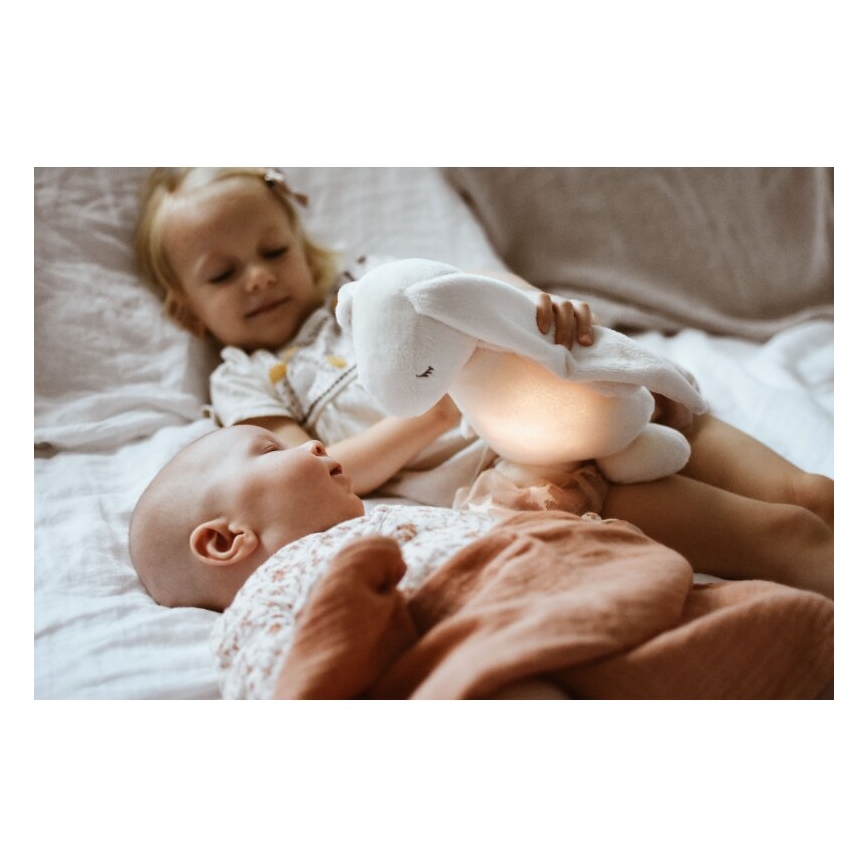 Moonie - Compagno di coccole con melodia e luce 2.0 coniglietto organic rosa