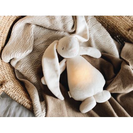 Moonie - Compagno di coccole con melodia e luce coniglietto 2.0 cream