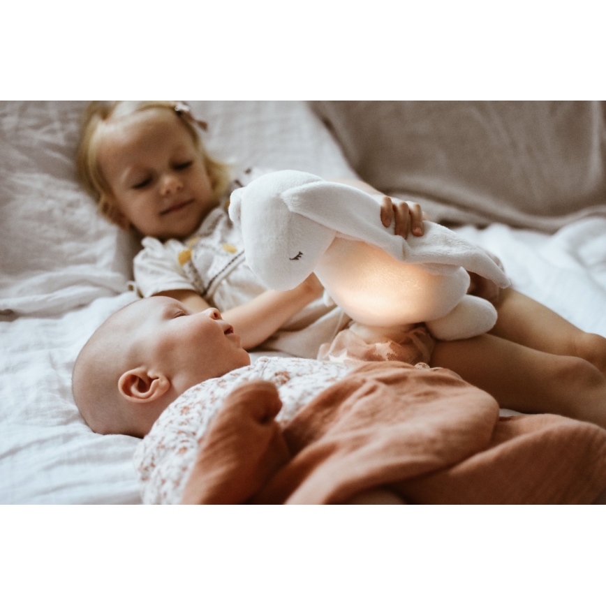 Moonie - Compagno di coccole con melodia e luce coniglietto 2.0 cream