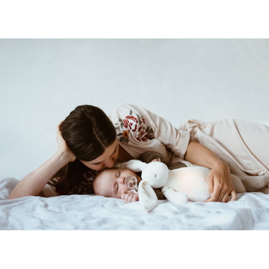 Moonie - Compagno di coccole con melodia e luce coniglietto 2.0 organic polar