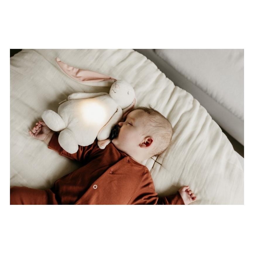 Moonie - Compagno di coccole con melodia e luce coniglietto powder