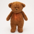Moonie - Compagno di coccole con melodia e luce orsacchiotto 2.0 organic caramel