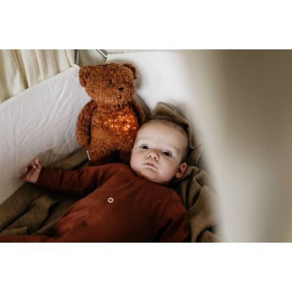 Moonie - Compagno di coccole con melodia e luce orsacchiotto 2.0 organic caramel