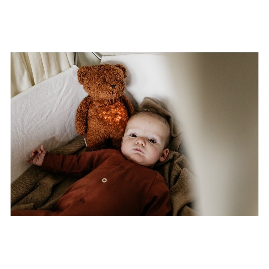 Moonie - Compagno di coccole con melodia e luce orsacchiotto 2.0 organic caramel