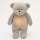 Moonie - Compagno di coccole con melodia e luce orsacchiotto 2.0 organic grigio