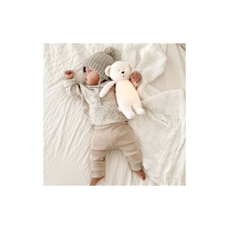 Moonie - Compagno di coccole con melodia e luce orsacchiotto cream