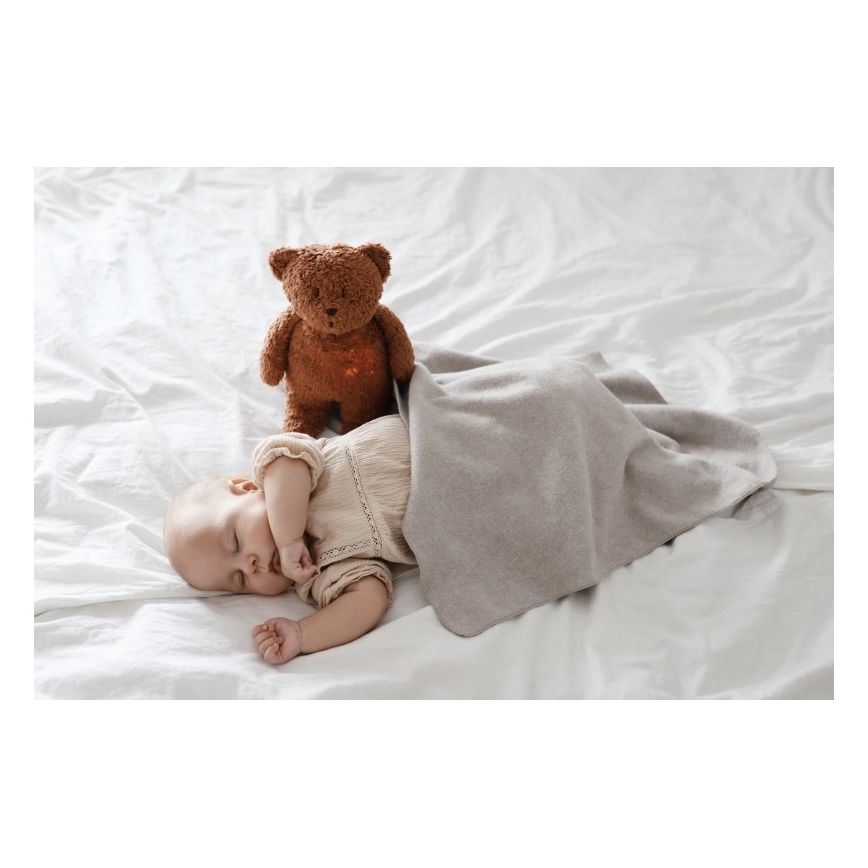 Moonie - Compagno di coccole con melodia e luce orsacchiotto organic caramel natur