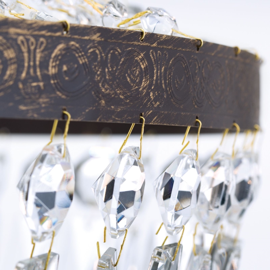 Lampadario di cristallo a sospensione con catena ARILA 6xE27/60W/230V diametro 60 cm marrone/patina