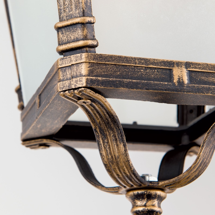 Lampada a sospensione da esterno AIKO 1x E27/60W/230V IP23 bronzo/patina