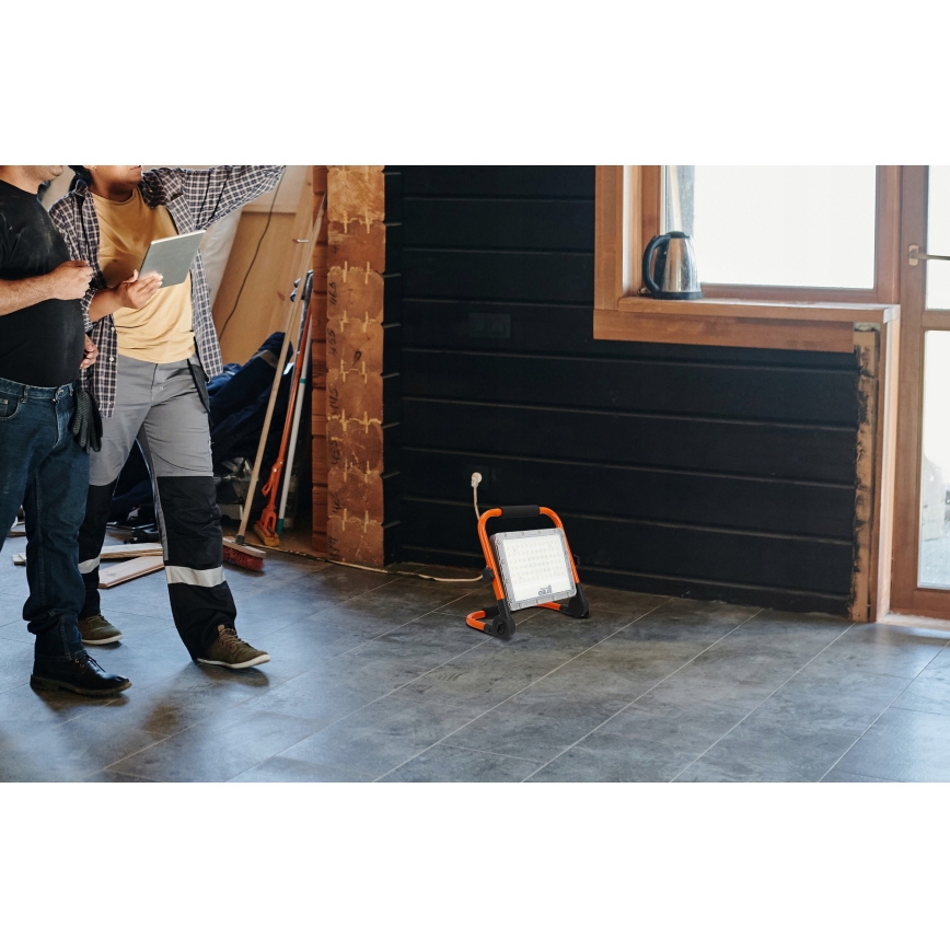 Proiettore LED con stativo, 100 W, 230 V, 4500 K, IP65, arancione