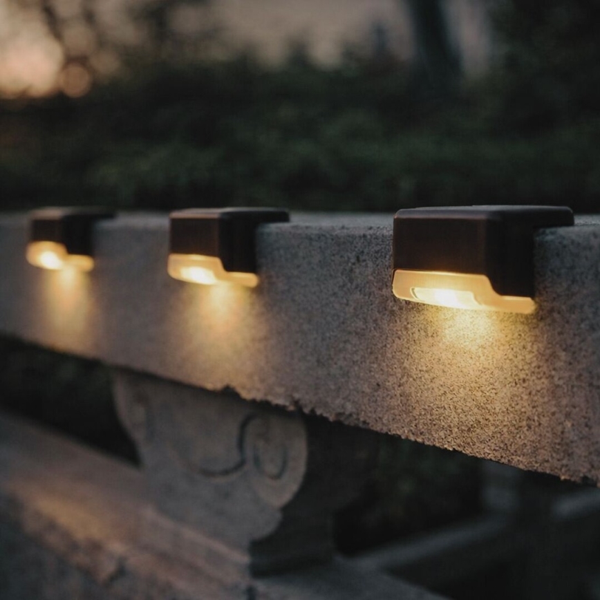 Rabalux - Set da 4 lampade da parete solari a LED con sensore crepuscolare LED/0,06W/1,2V 300 mAh IP44