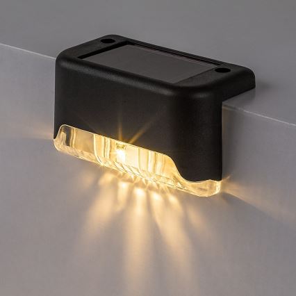 Rabalux - Set da 4 lampade da parete solari a LED con sensore crepuscolare LED/0,06W/1,2V 300 mAh IP44