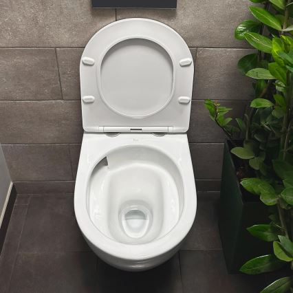 REA-C1259 - WC sospeso con sedile CARLO MINI TORNADO RIMLESS in ceramica/bianco lucido