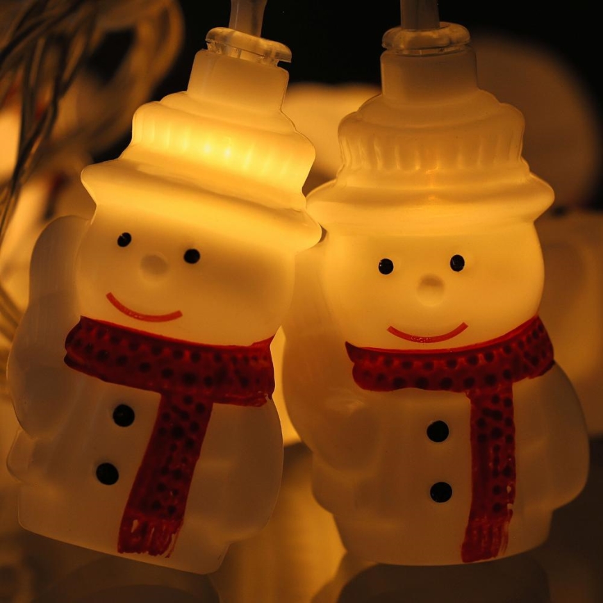 Catena luminosa natalizia LED 20xLED/3xAA/bianco caldo 3,3m pupazzi di neve