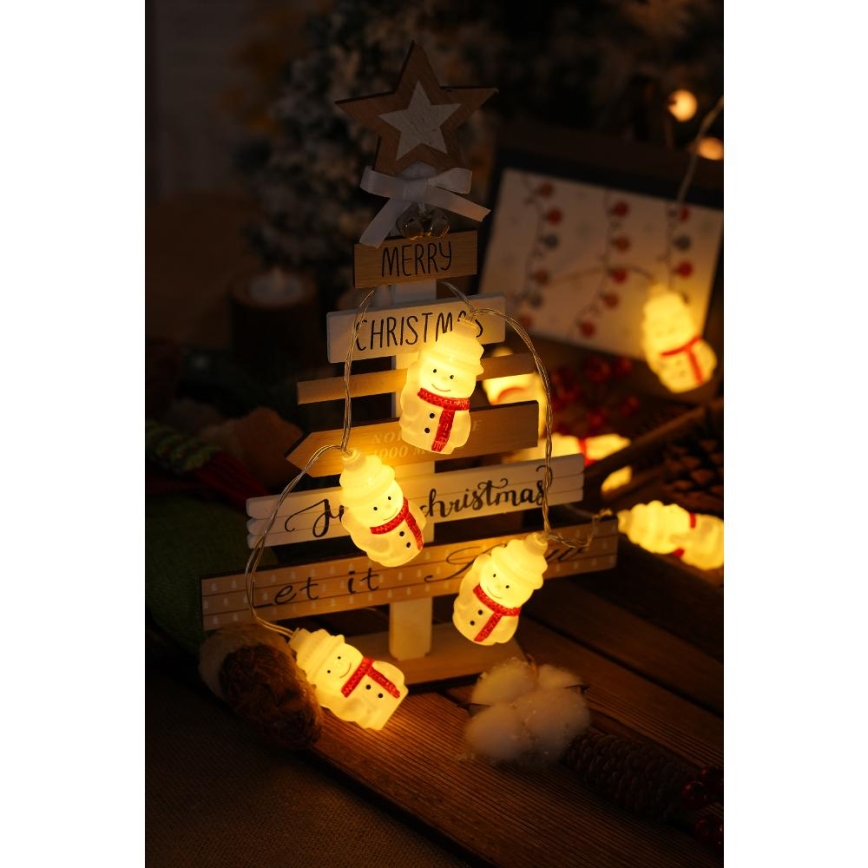 Catena luminosa natalizia LED 20xLED/3xAA/bianco caldo 3,3m pupazzi di neve