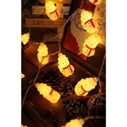 Catena luminosa natalizia LED 20xLED/3xAA/bianco caldo 3,3m pupazzi di neve