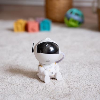 Proiettore LED per bambini 230V astronauta 12,5 cm + telecomando