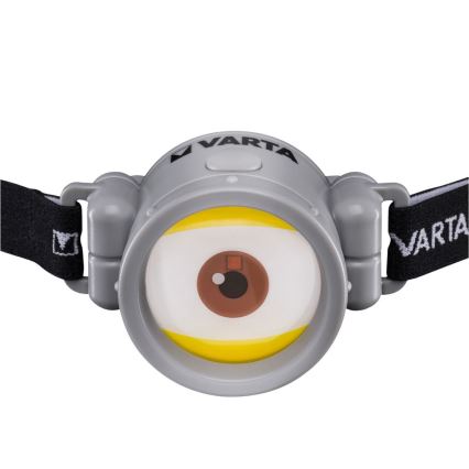 Varta 15611 - Lampada LED frontale per bambini MINIONS LED/5W/1xAAA